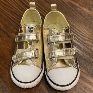 Gently used toddler sized gold converse Velcro strap